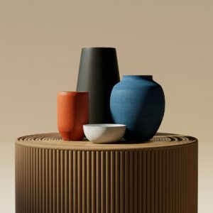 Cobalt, ochre and black glazed vessels on a round wooden stand